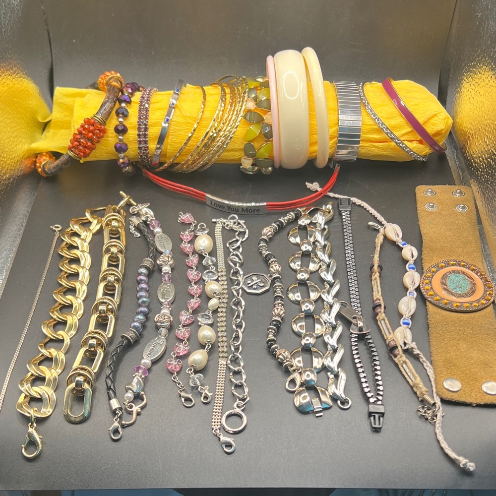 35 gold and silver bracelet lot